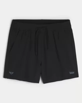 Aktiva shorts med logotyp på mitten av låret