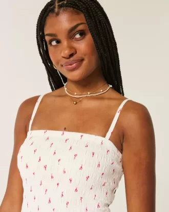 Axelbandslös smockad bodice miniklänning