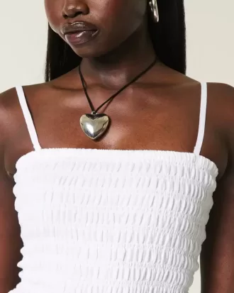 Axelbandslös smockad bodice miniklänning