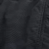 Baggy fotbollsshorts på mitten av låret