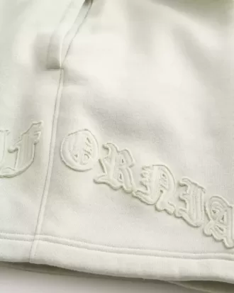 Calif grafiska baggy fleeceshorts ovanför knäet