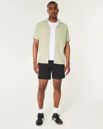 Cooling flat-front shorts 7″