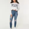 Curvy High-Rise Ripped Medium Wash Super Skinny Jeans Curvy High-Rise Ripped Medium Wash Super Skinny Jeans