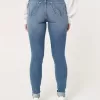 Curvy High-Rise Ripped Medium Wash Super Skinny Jeans Curvy High-Rise Ripped Medium Wash Super Skinny Jeans
