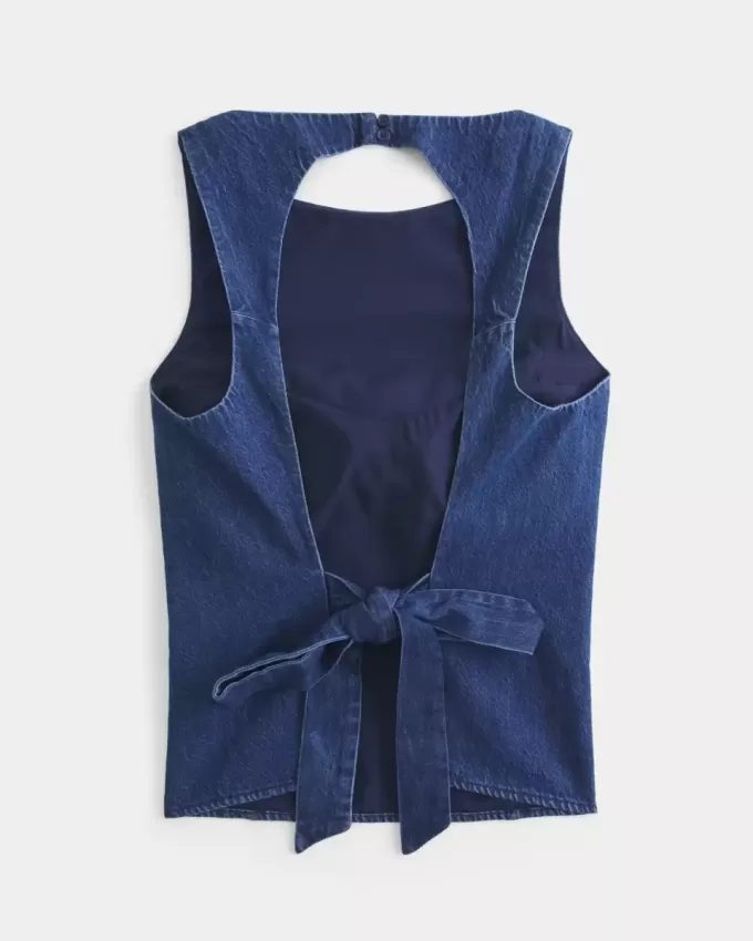 Denim med öppen rygg Denim med öppen rygg