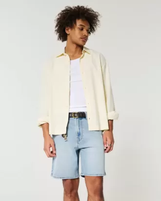 Distressed lösa jeansshorts ovanför knäet