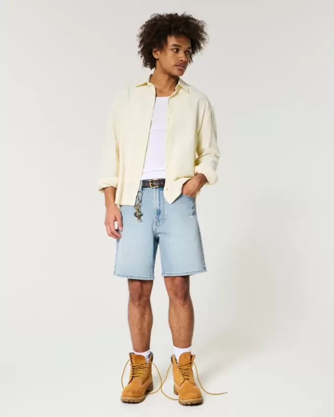 Distressed lösa jeansshorts ovanför knäet