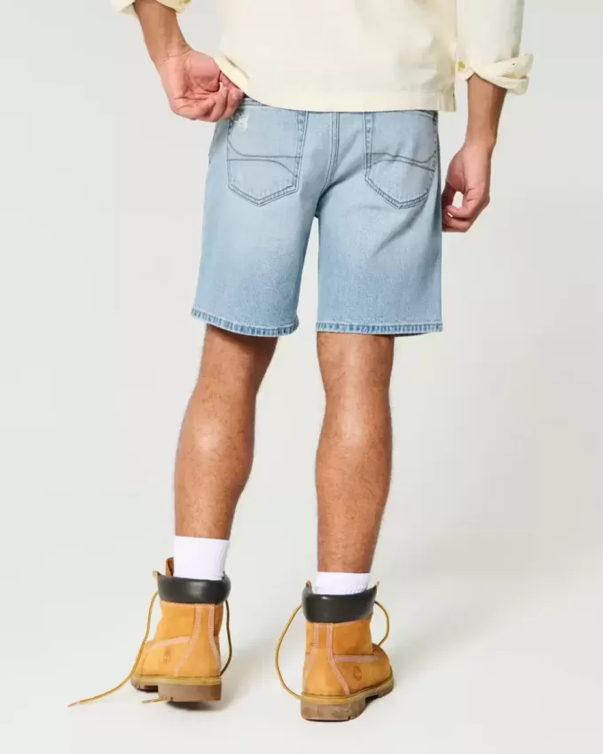Distressed lösa jeansshorts ovanför knäet