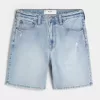 Distressed lösa jeansshorts ovanför knäet