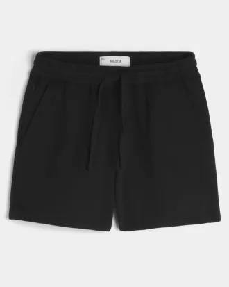 Fleeceshorts på mitten av låret