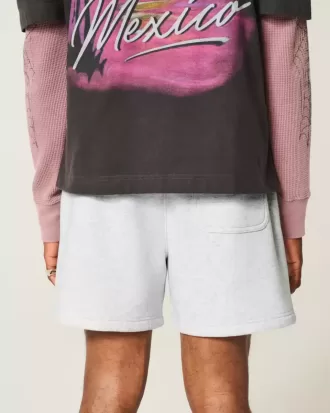 Fleeceshorts på mitten av låret