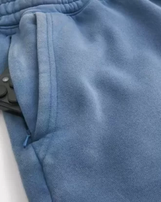 Fleeceshorts på mitten av låret