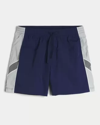 Fotbollsshorts på mitten av låret