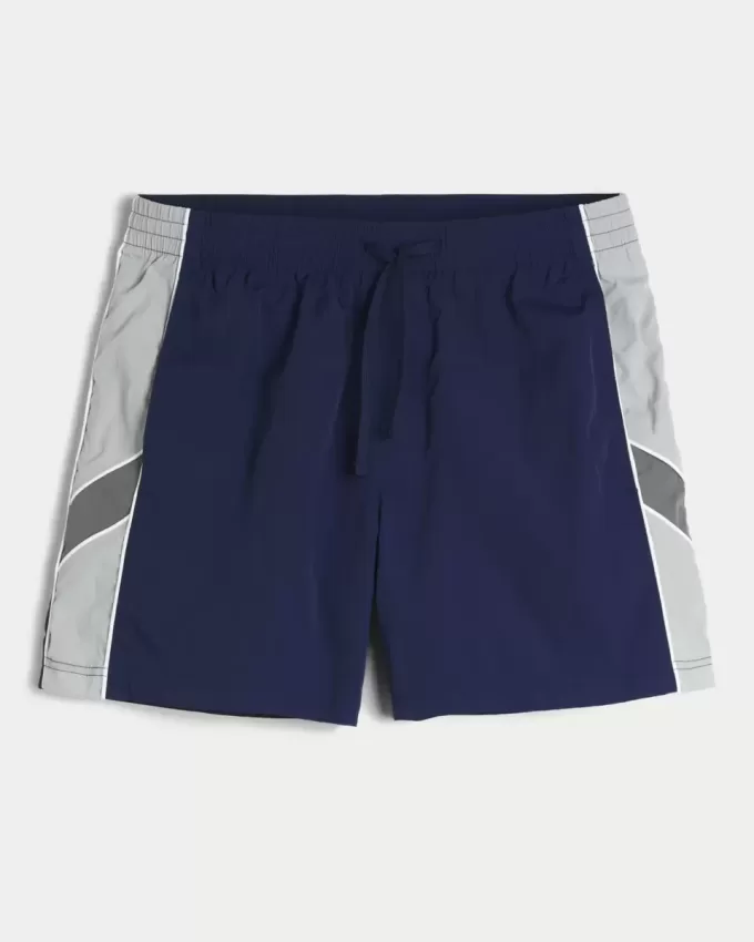 Fotbollsshorts på mitten av låret