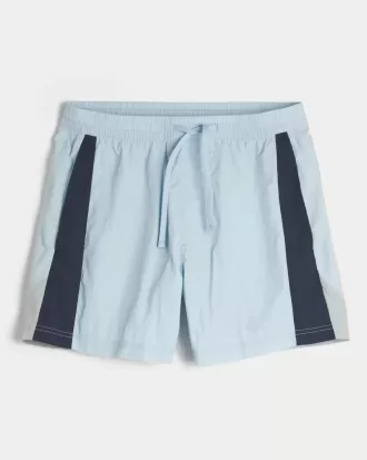 Fotbollsshorts på mitten av låret