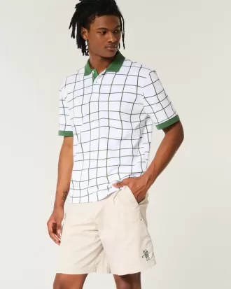 Golfshorts som kyler över knäet