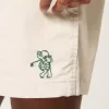 Golfshorts som kyler över knäet