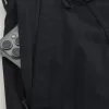 Golfshorts som kyler över knäet