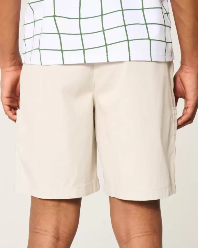 Golfshorts som kyler över knäet