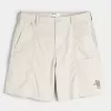 Golfshorts som kyler över knäet