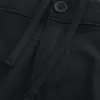 Golfshorts som kyler över knäet