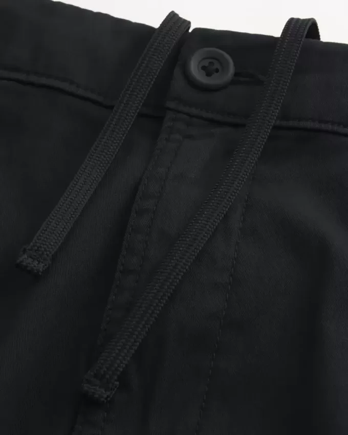 Golfshorts som kyler över knäet
