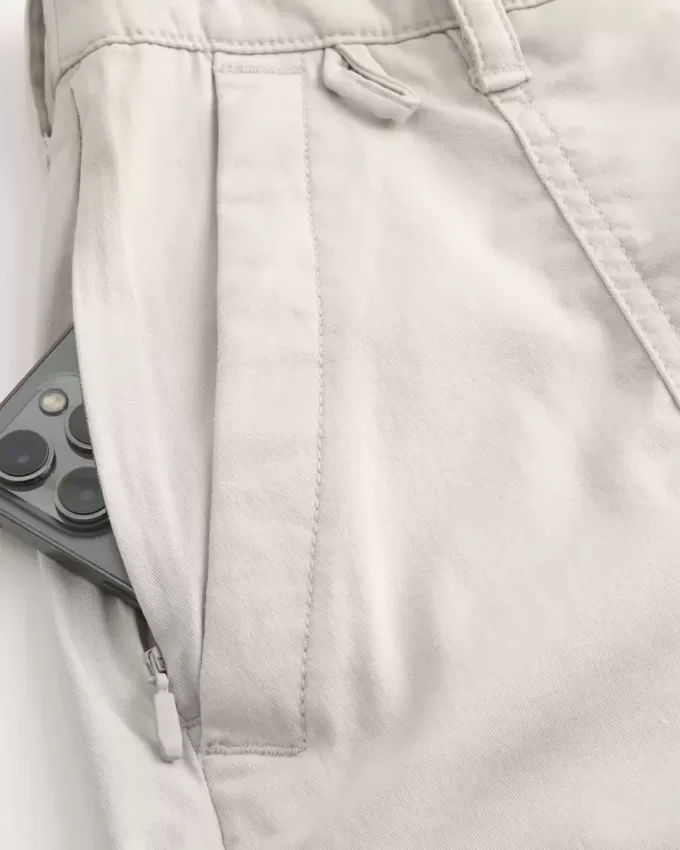 Golfshorts som kyler över knäet