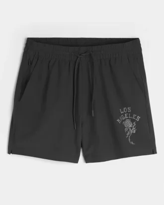 Grafiska aktiva shorts på mitten av låret