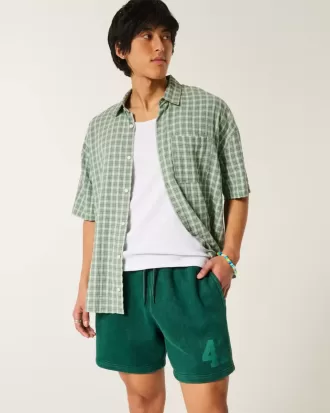 Grafiska lös fleeceshorts på mitten av låret