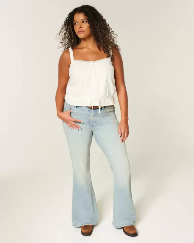 High-Rise Light Wash Star Pocket Flare Jeans High-Rise Light Wash Star Pocket Flare Jeans