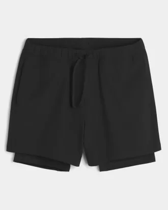 Hybrid aktiva shorts på mitten av låret