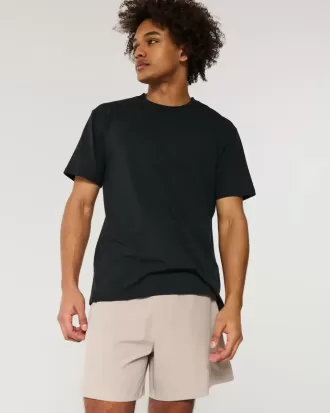 Hybrid aktiva shorts på mitten av låret