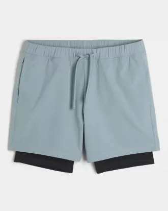 Hybrid aktiva shorts på mitten av låret