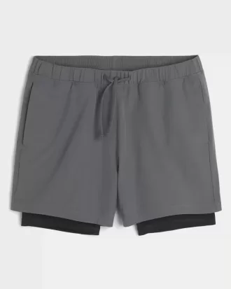 Hybrid aktiva shorts på mitten av låret