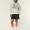 Hybrid aktiva shorts på mitten av låret