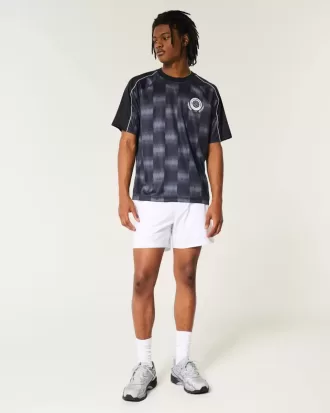 Hybrid aktiva shorts på mitten av låret