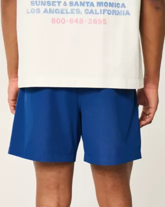 Hybrid aktiva shorts på mitten av låret