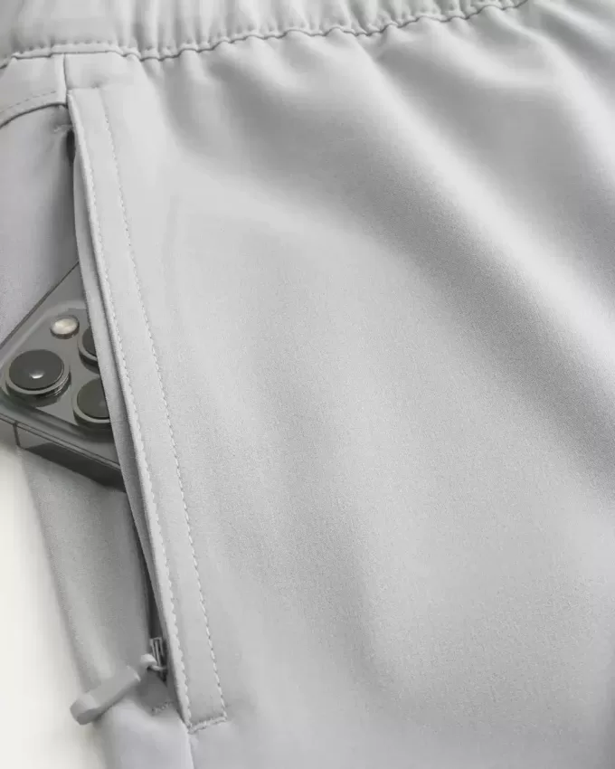 Hybrid aktiva shorts på mitten av låret