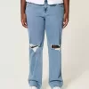 Kurviga Låg-Rise Ripped Medium Wash Relaxed Straight Jeans Kurviga Låg-Rise Ripped Medium Wash Relaxed Straight Jeans