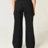 Kurviga låga svarta baggy jeans