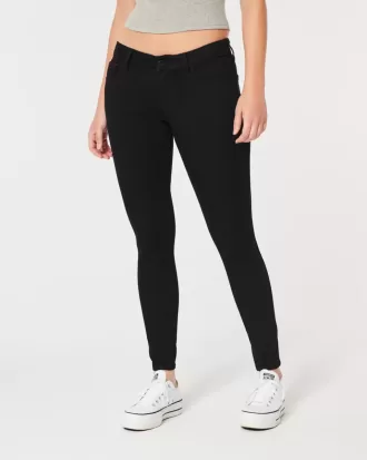 Kurviga låga svarta superskinny jeans