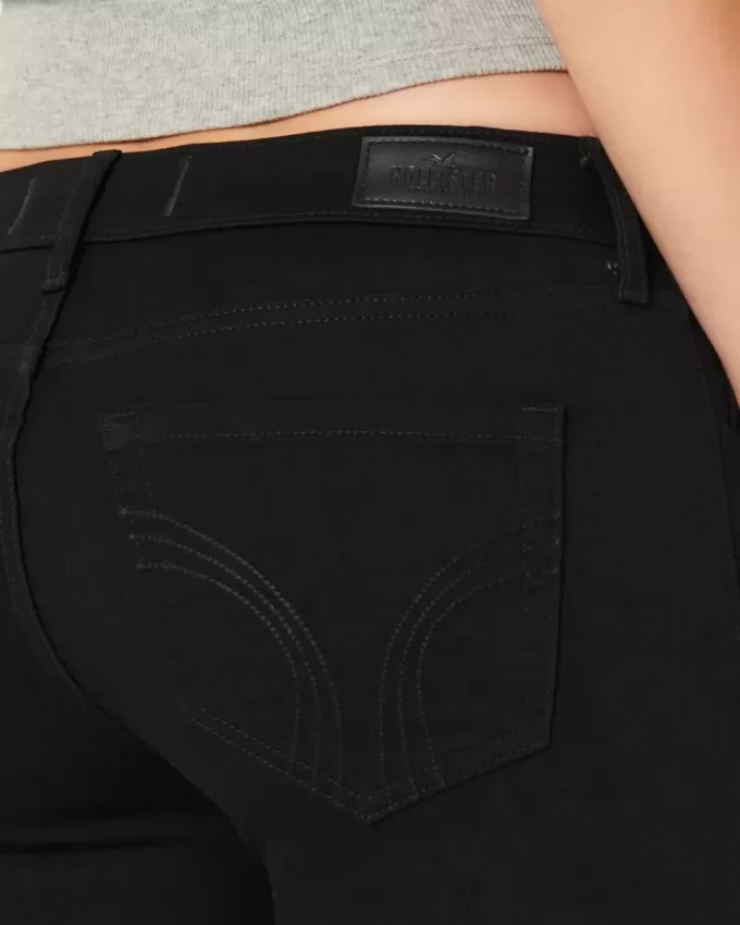 Kurviga låga svarta superskinny jeans