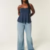 Kurviga väska jeans i hög uppbyggnad Kurviga väska jeans i hög uppbyggnad