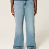 Kurviga väska jeans i hög uppbyggnad Kurviga väska jeans i hög uppbyggnad