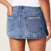 Kurvlig låg-Rise broderad rosett Denim Mini Skort Kurvlig låg-Rise broderad rosett Denim Mini Skort