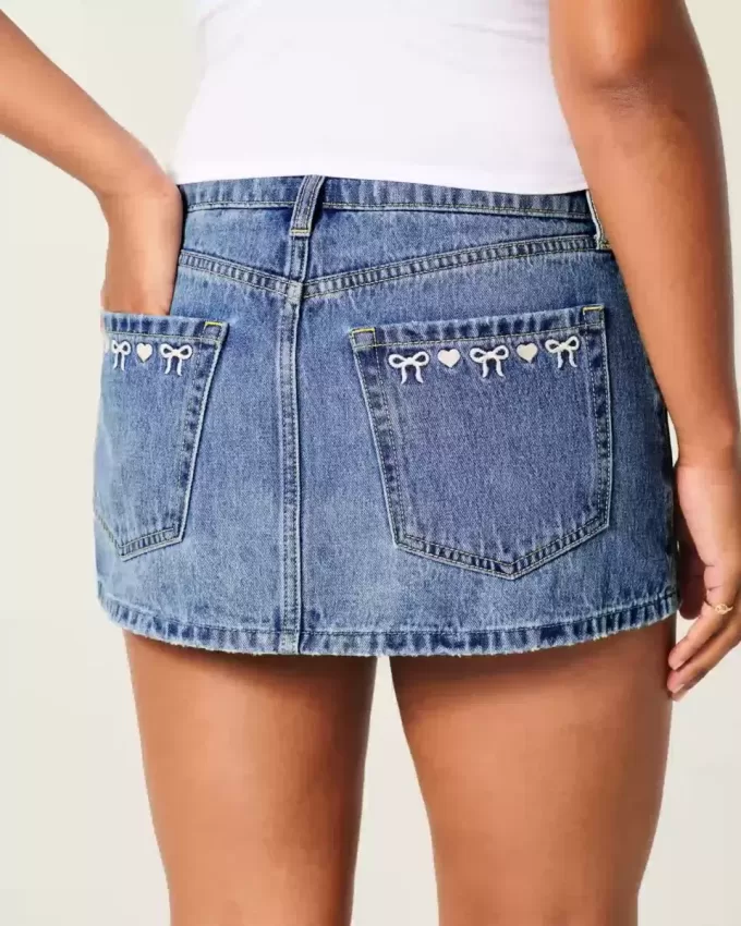 Kurvlig låg-Rise broderad rosett Denim Mini Skort Kurvlig låg-Rise broderad rosett Denim Mini Skort