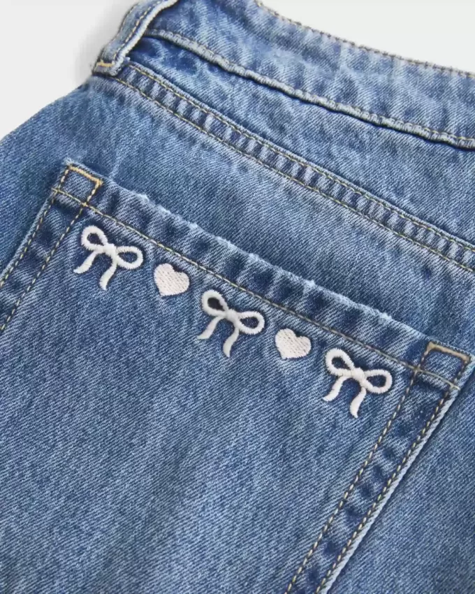 Kurvlig låg-Rise broderad rosett Denim Mini Skort Kurvlig låg-Rise broderad rosett Denim Mini Skort