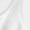 Linneblandning med knappgenomgående topp