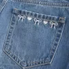 Low-Rise broderad rosett Denim Mini Skort