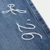 Low-Rise Dark Wash Class of ’26 Broderade Baggy Jeans Low-Rise Dark Wash Class of ’26 Broderade Baggy Jeans